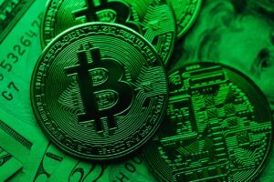 Bitcoin vs Ethereum: Key Differences, Use Cases & Investment Considerations Close-up of Bitcoin coins on paper cash, with a green color tint.
